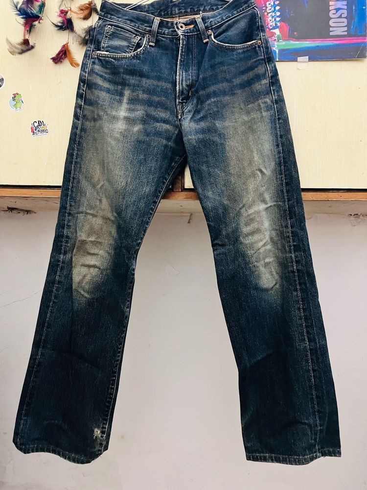 Distressed Denim Jeans