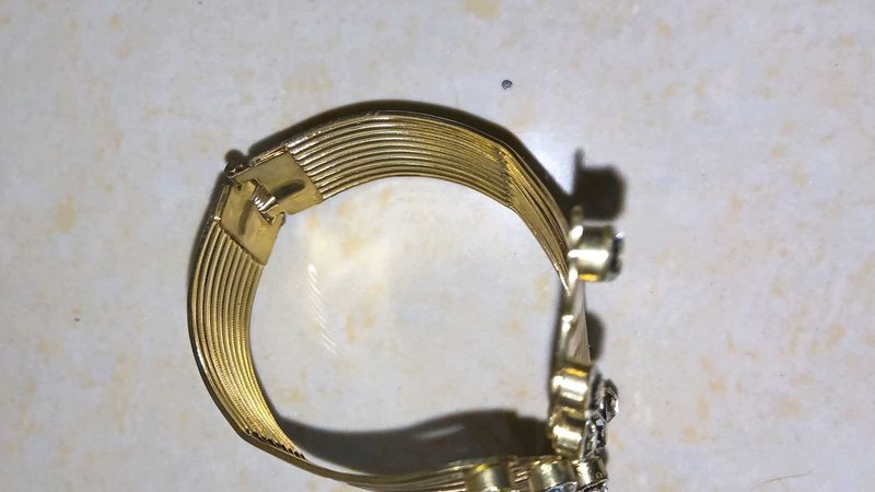Elegant Gold Cuff Bracelet with Crystals