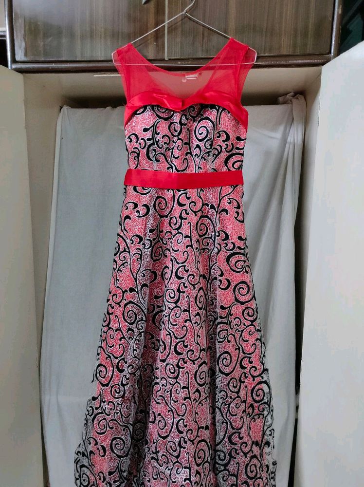 Glittery Red Gown With Black Detailing