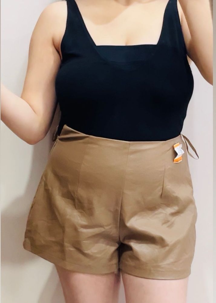 Combo -bodysuit + leather skort