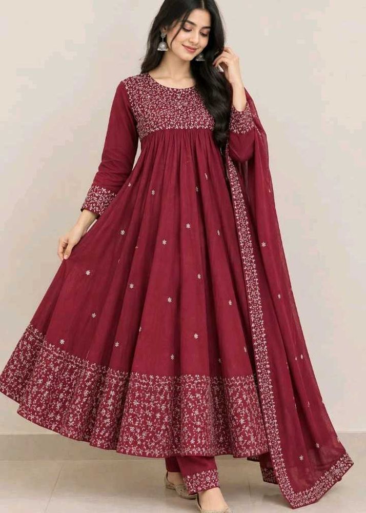 Embroidery anarkali dress with free green suit