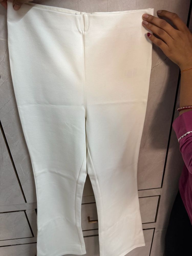 women white slim fit mid rise trousers