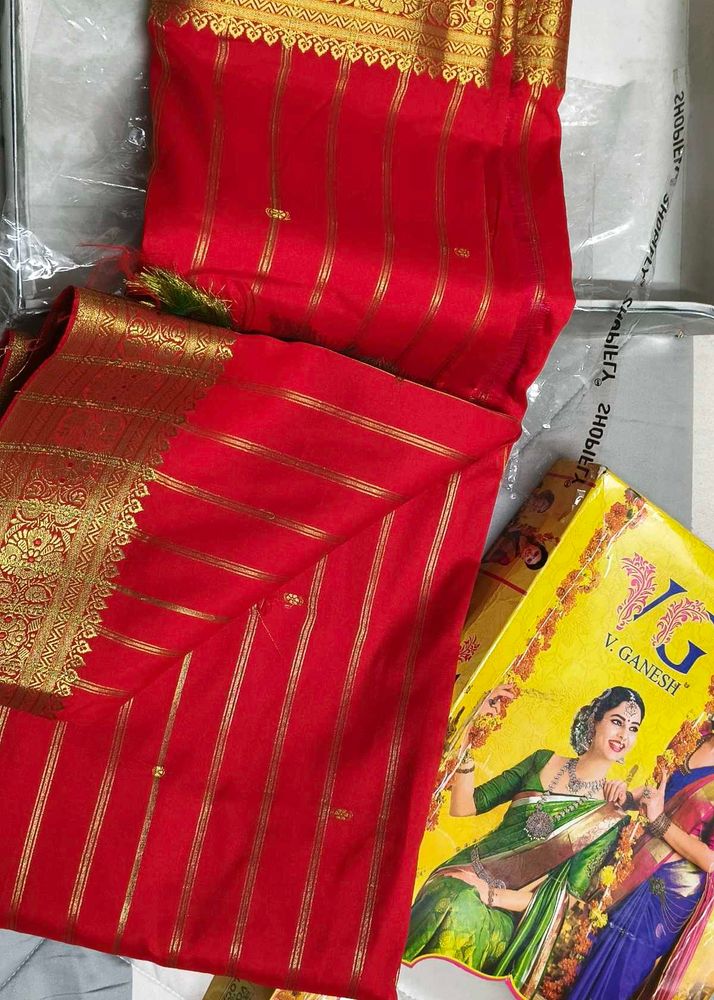 Vibrant Red Saree with Gold Stripes
