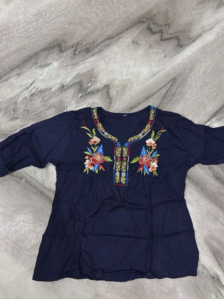 blue embroidery top