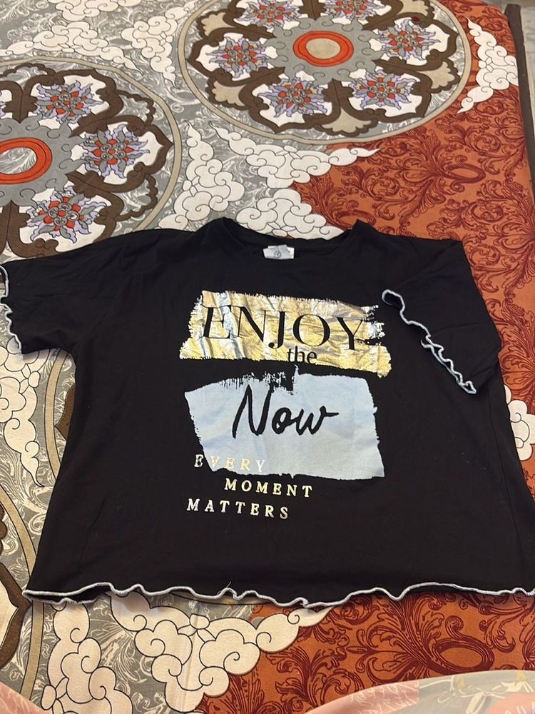 Black T-Shirt with "Enjoy the Now"