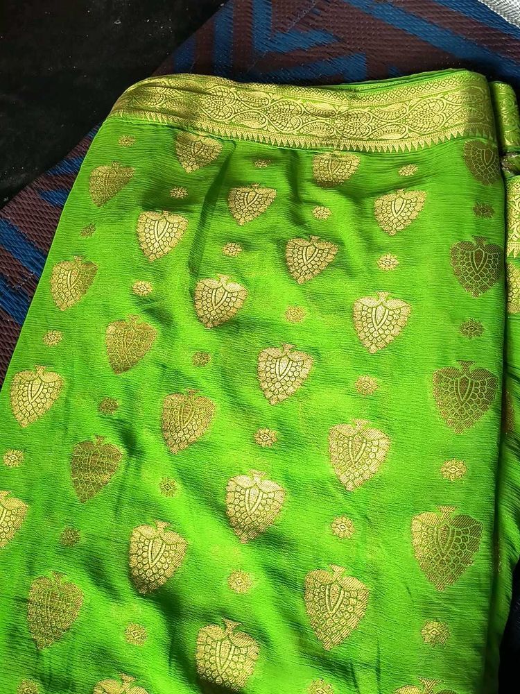 Vibrant Green Saree with Golden Motifs