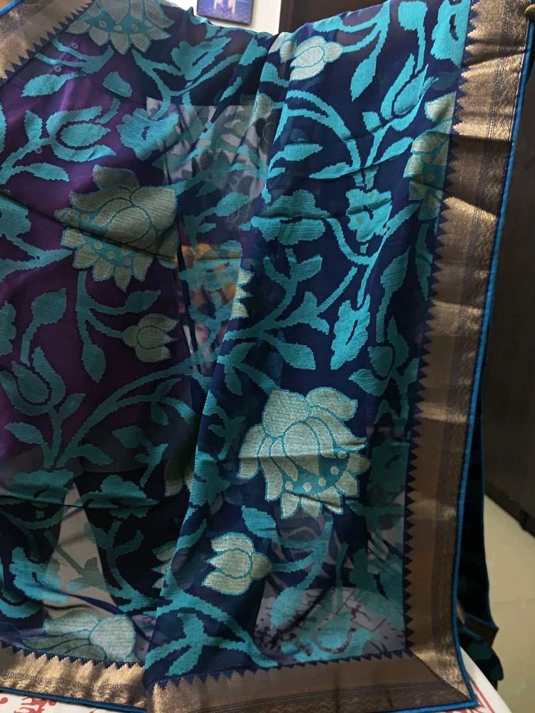 Elegant Blue Floral Saree with rose gold border