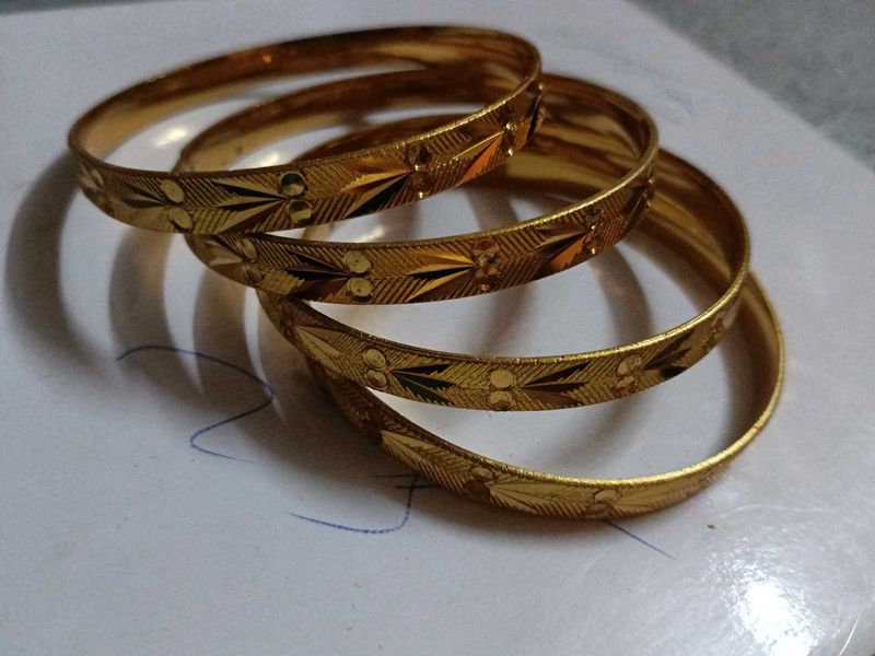 Elegant Gold Tone Bangles