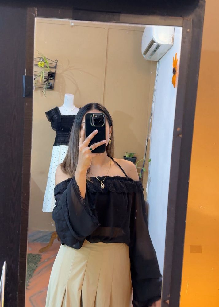 Off-Shoulder Ruffle Black Top with camel skir