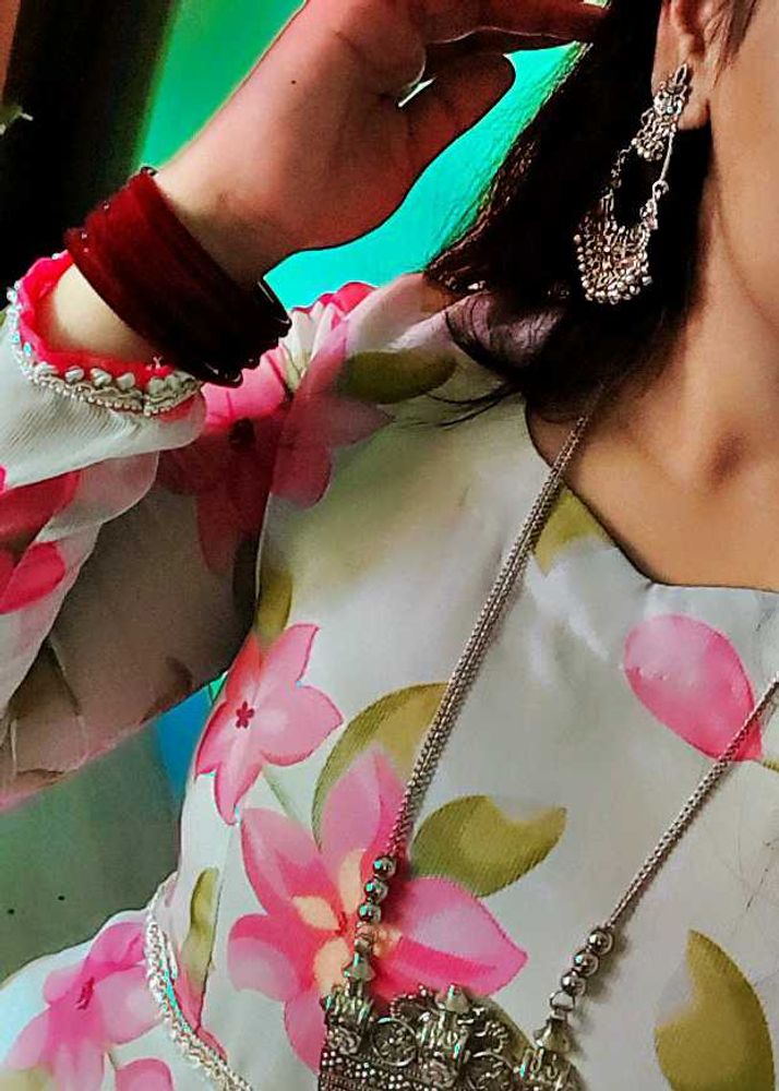 Elegant Floral Kurta with Statement Jewelry
