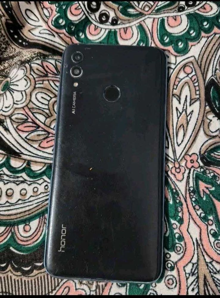 Used Smartphone with Earth Wallpaper