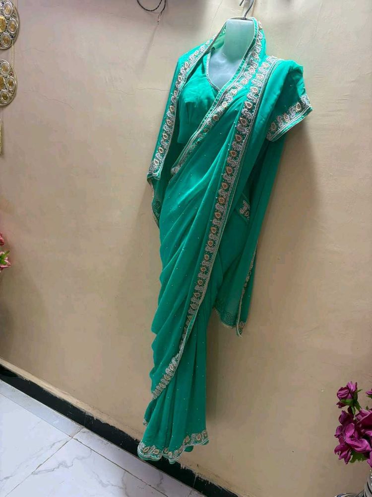 Elegant Teal Embellished Saree