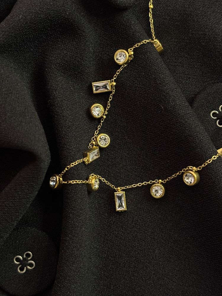 Gold Tone Crystal Charm Necklace