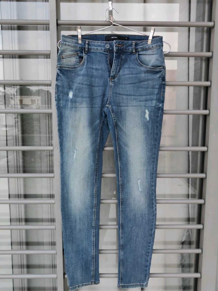 Distressed Blue Denim Jeans