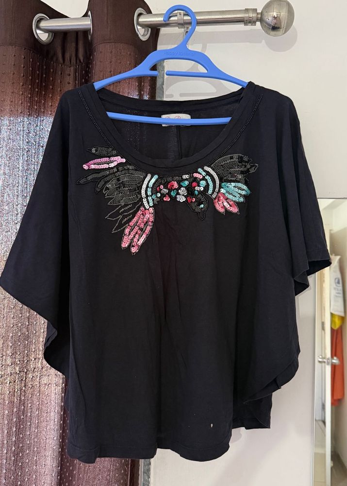 Embellished Black T-Shirt with Unique Design