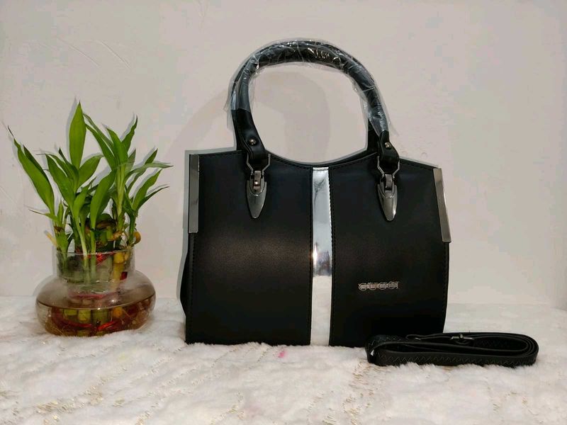 Chic Black Handbag with Silver Accent