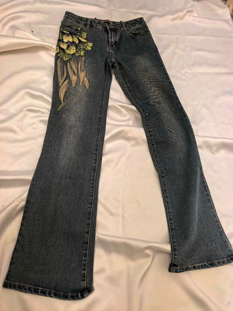 Unique Flared Jeans with Floral Design
