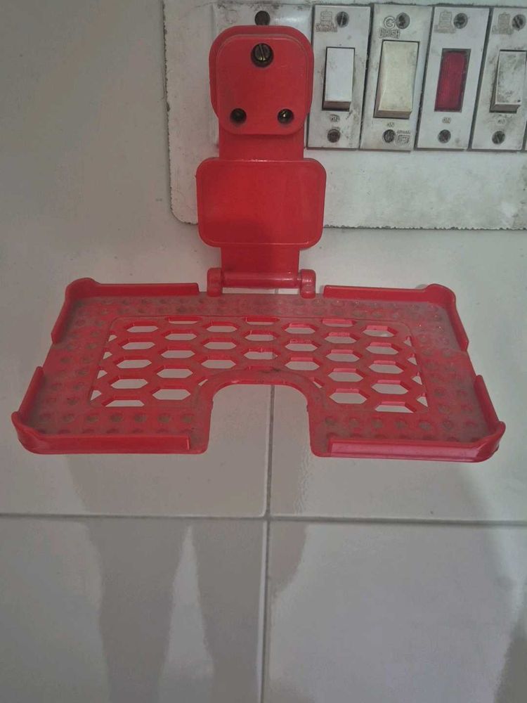 Red phone Shelf while charging