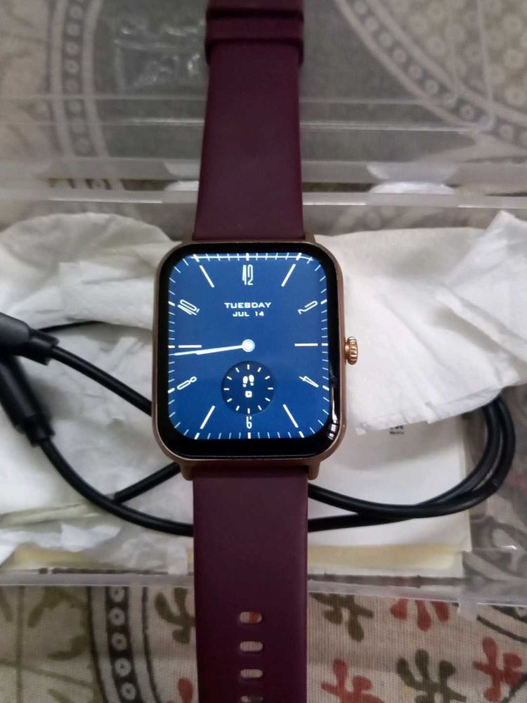 SMART WATCH  FIRE BOLTT ROSE AND MAROON