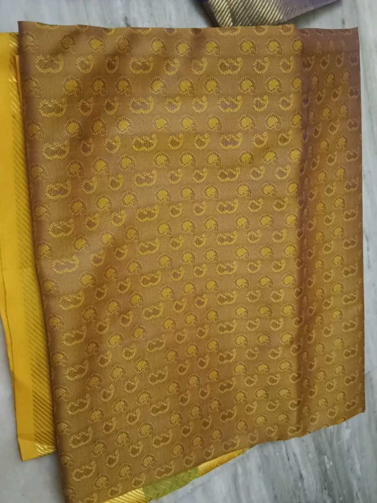 Elegant Mustard Saree with Intricate Pattern