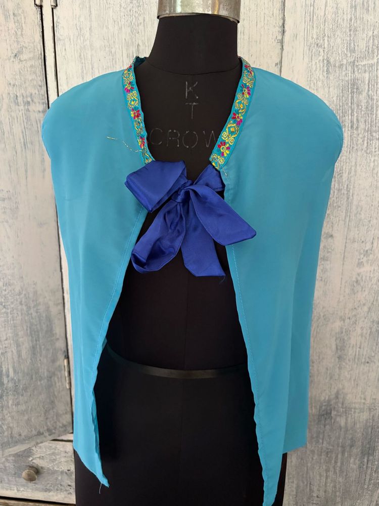 Turquoise top with Embroidered Neckline