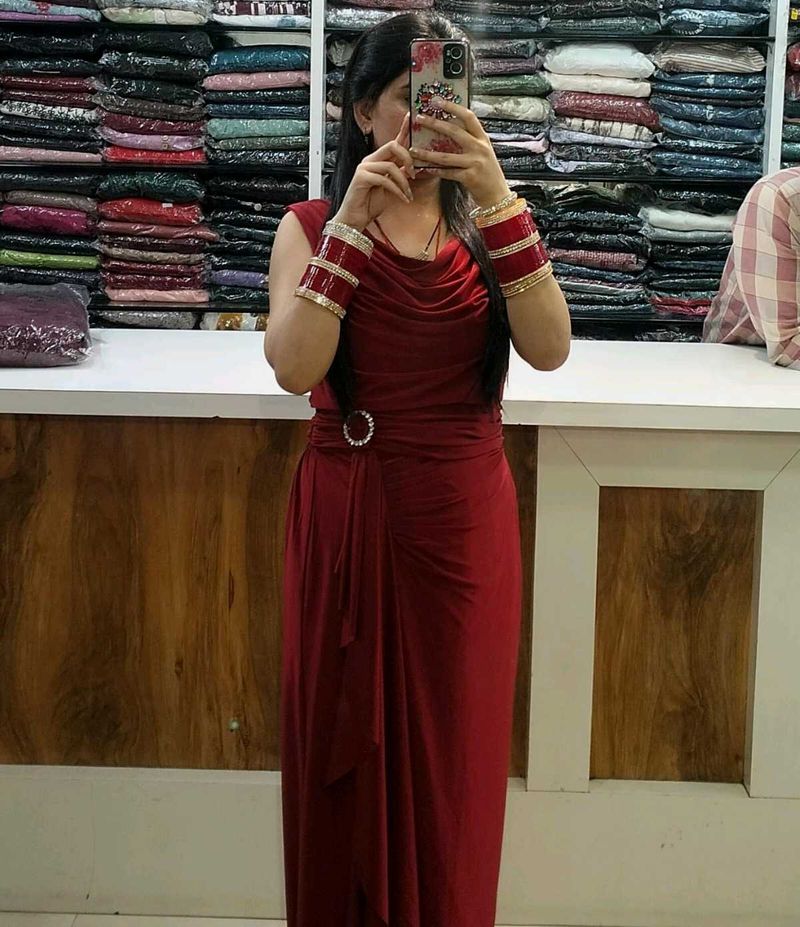 Elegant Red Gown with Embellished Waist