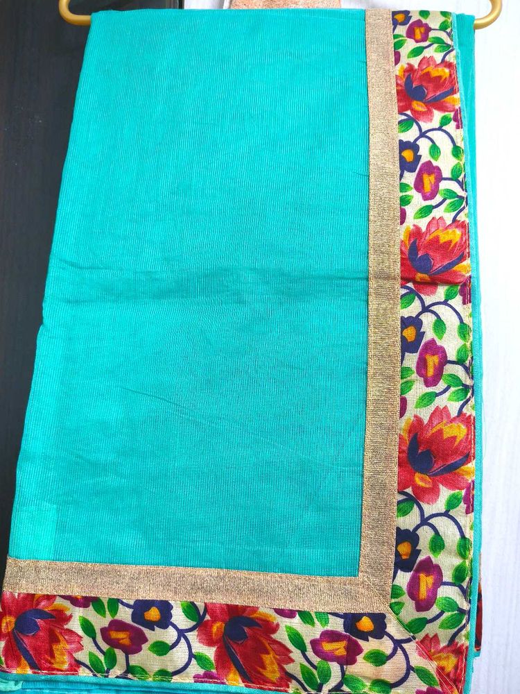 Beautiful Teal Saree with Floral Border