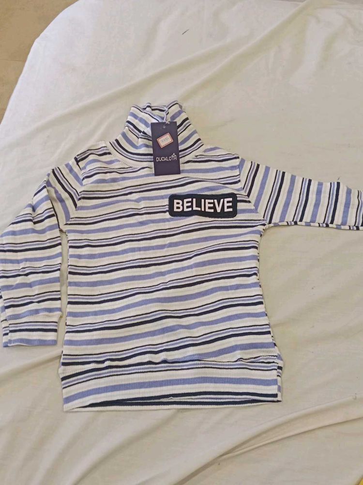 Striped Turtleneck with BELIEVE Patch