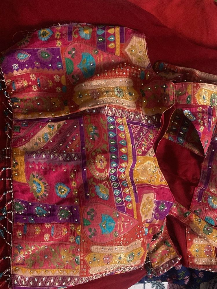 Red plazzo with stone work multi colour top