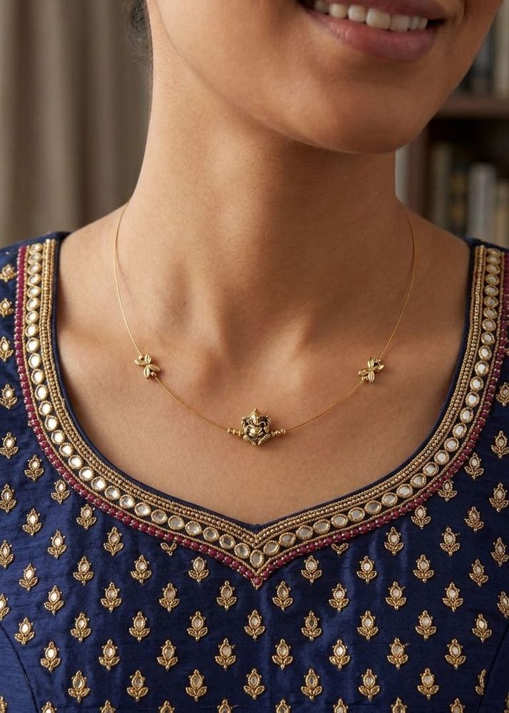 Delicate Gold Necklace with Ganesha Pendant