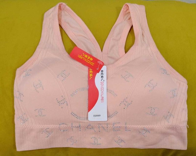 261 -- pitch Sports Bra with Rhinestone Logo