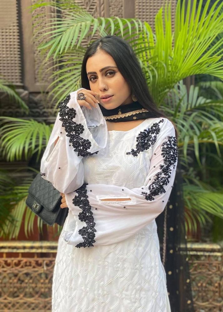 Elegant White Kurta Set with Black Embroidery