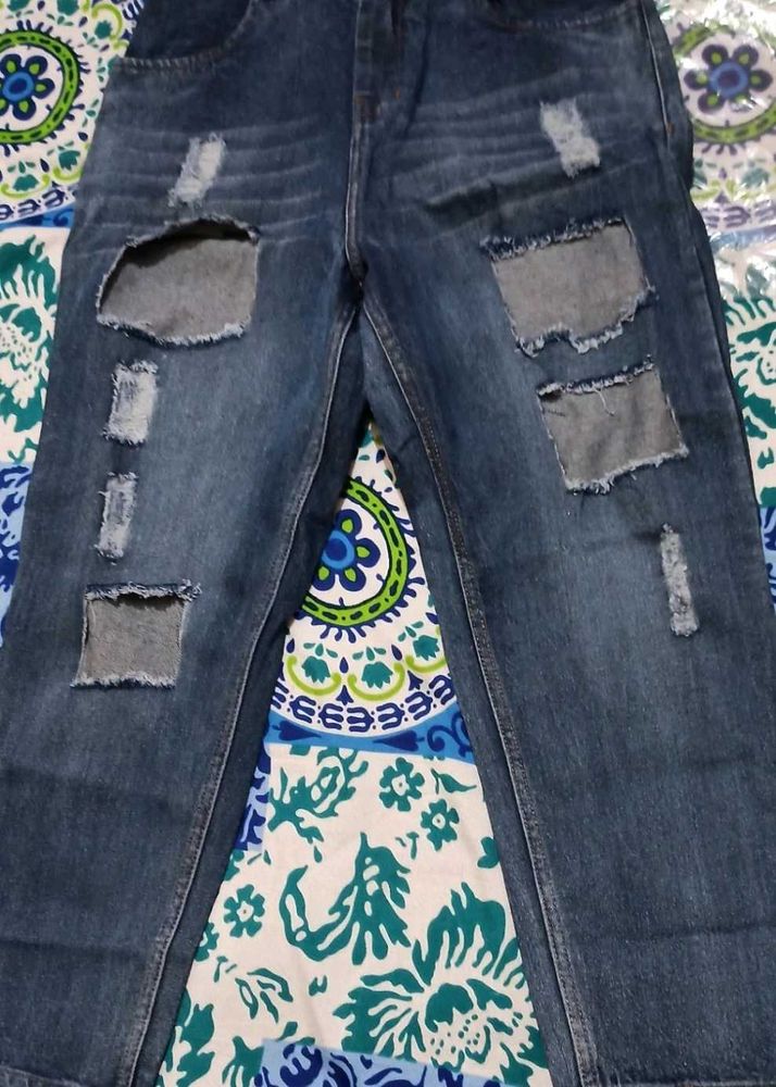 Distressed Patchwork Denim Jeans