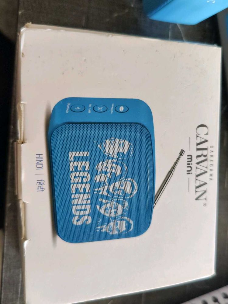 Saregama Carvaan Mini Legends in red, blue green