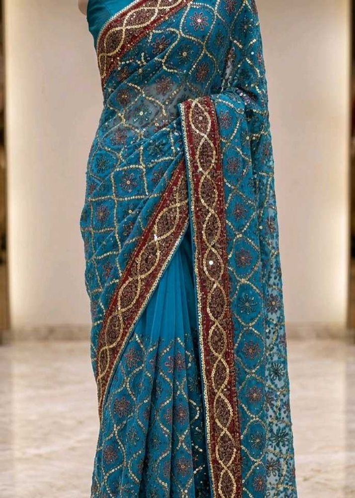 Stunning Teal Embroidered Saree