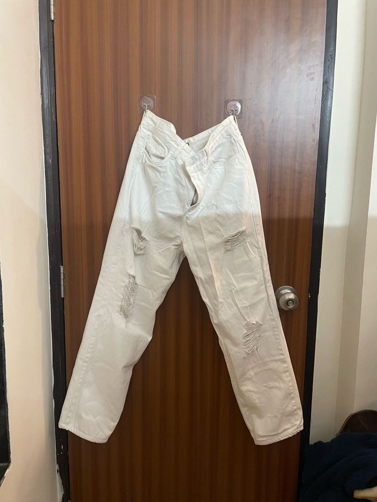 Cream Distressed Denim Jeans