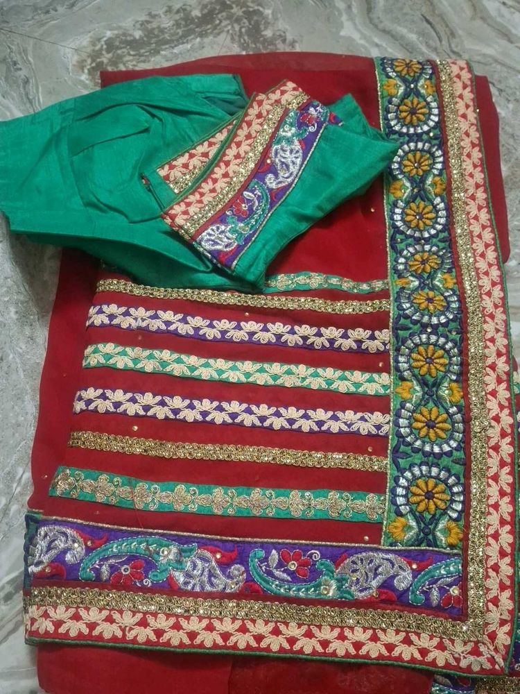 Embroidered Red Saree with Green Blouse