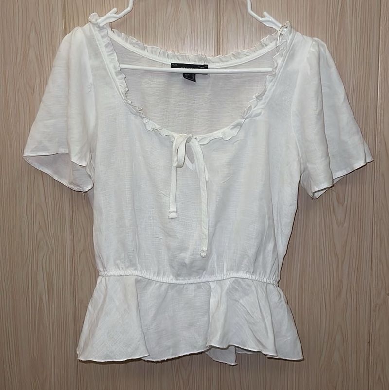 Whimsical White Ruffled Peplum Top