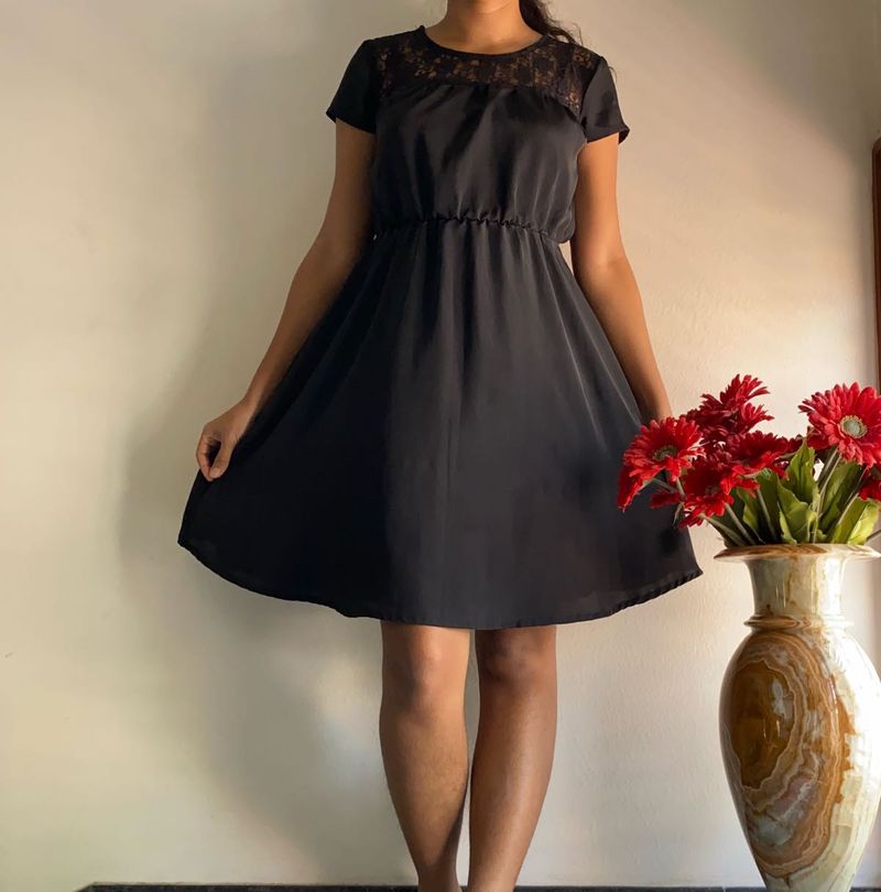 Elegant Black Dress with Lace Detail