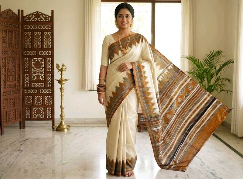 Elegant Cream Saree with Brown Border