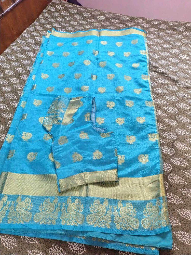 Stunning Blue Saree with Gold Weave