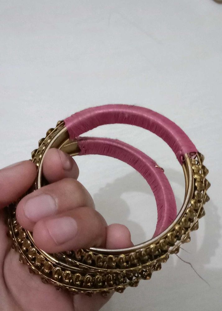 Elegant Gold Tone Bangles with Pink Thread Work