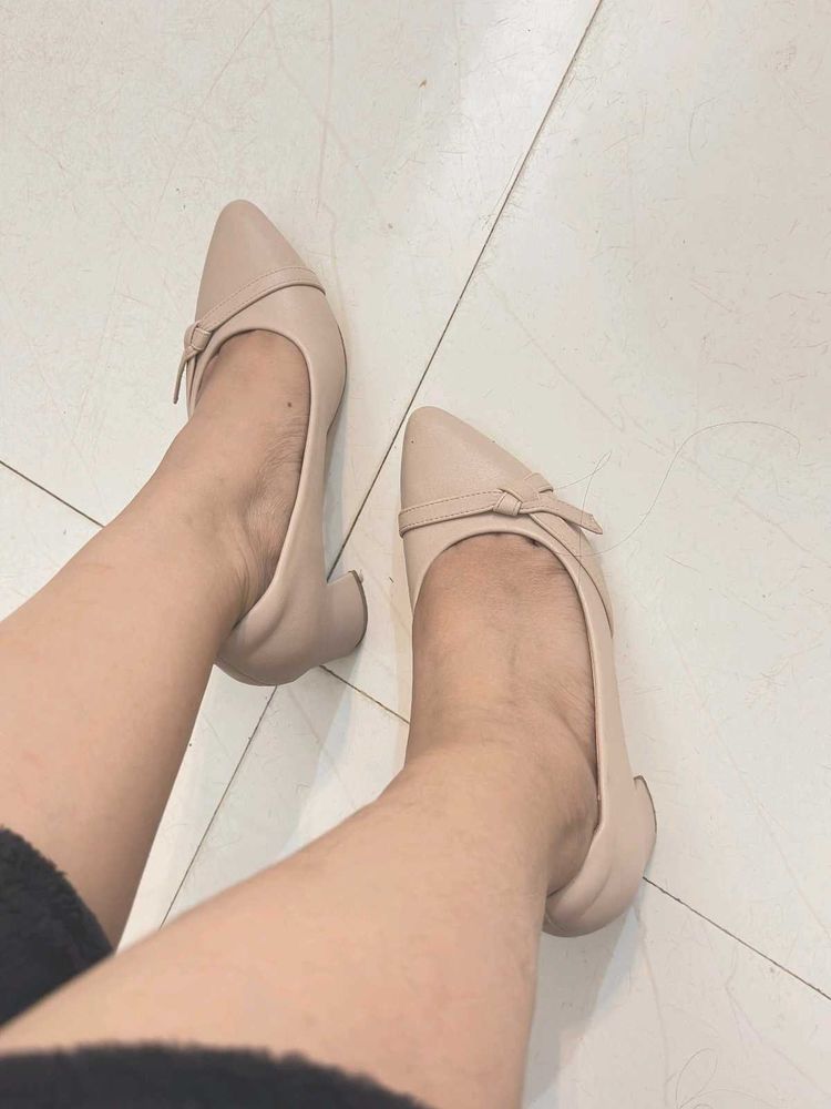 Elegant Nude Heels with Bow Detail
