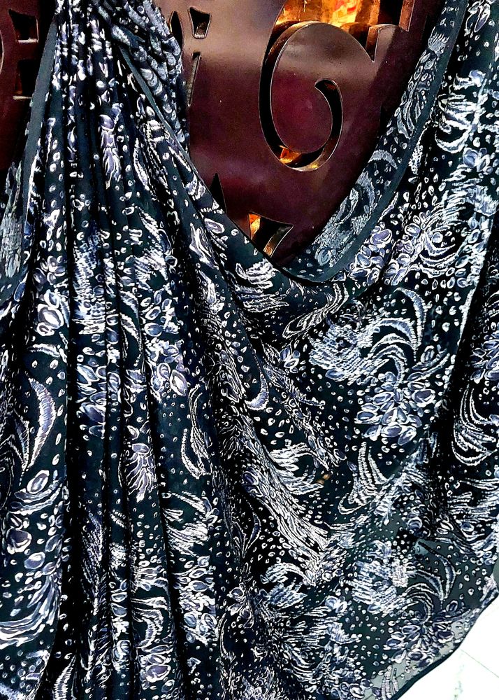 Elegant Black brasso boutique saree.