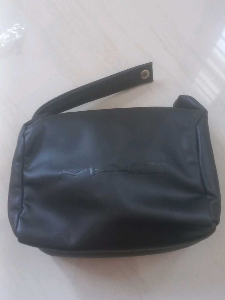 Black MAC Bag and cleansing oil