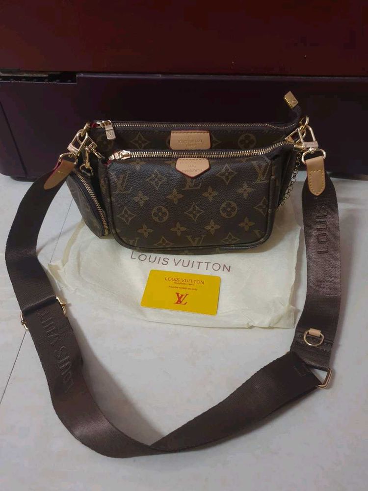 Louis Vuitton pochette With Pink Belt