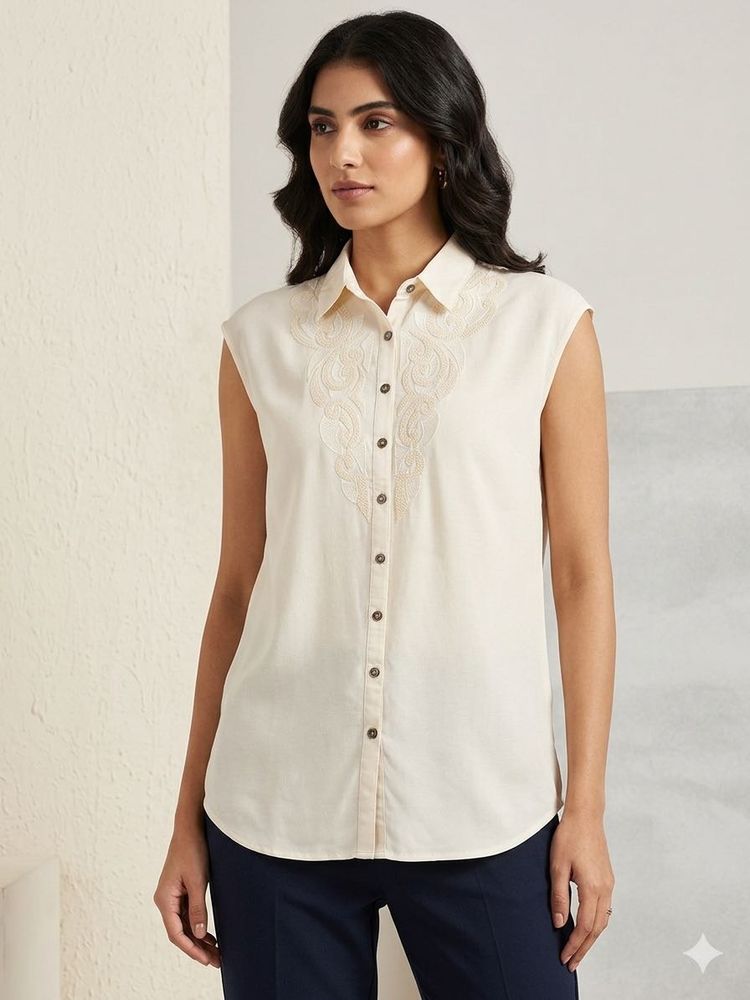 Elegant Cream Embroidered Sleeveless Blouse