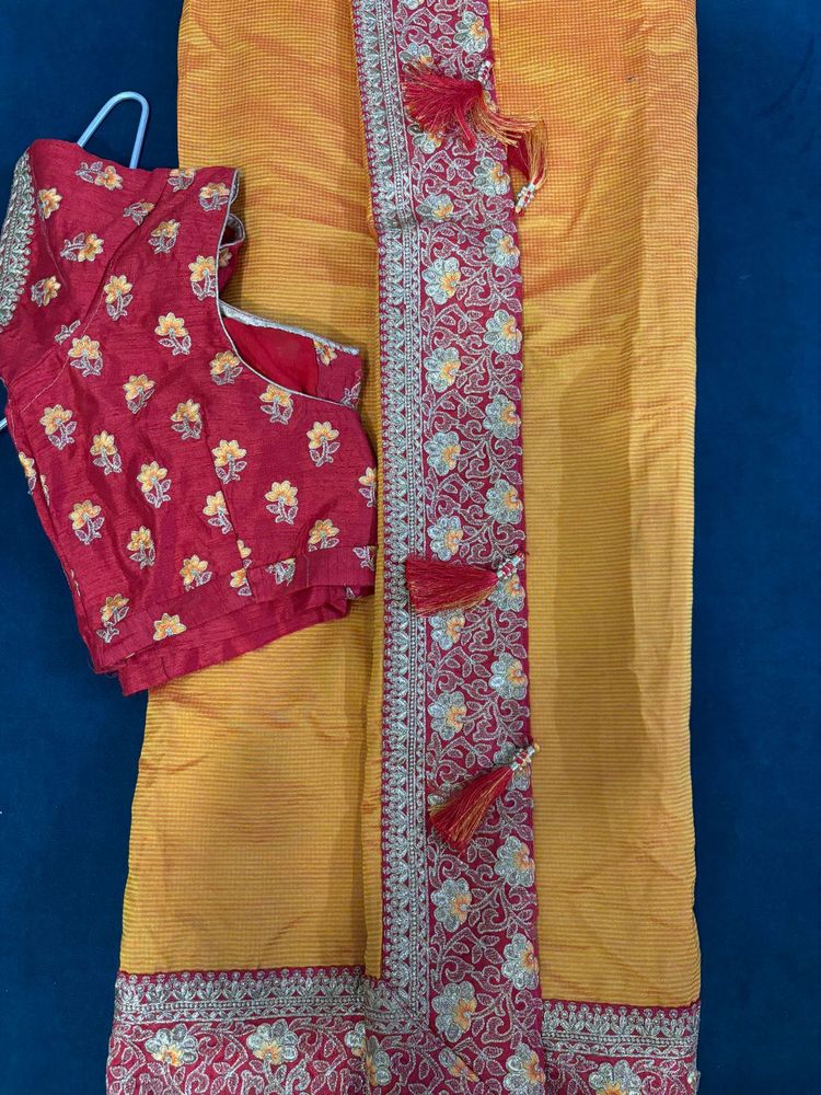 Elegant Yellow Saree with Red Blouse