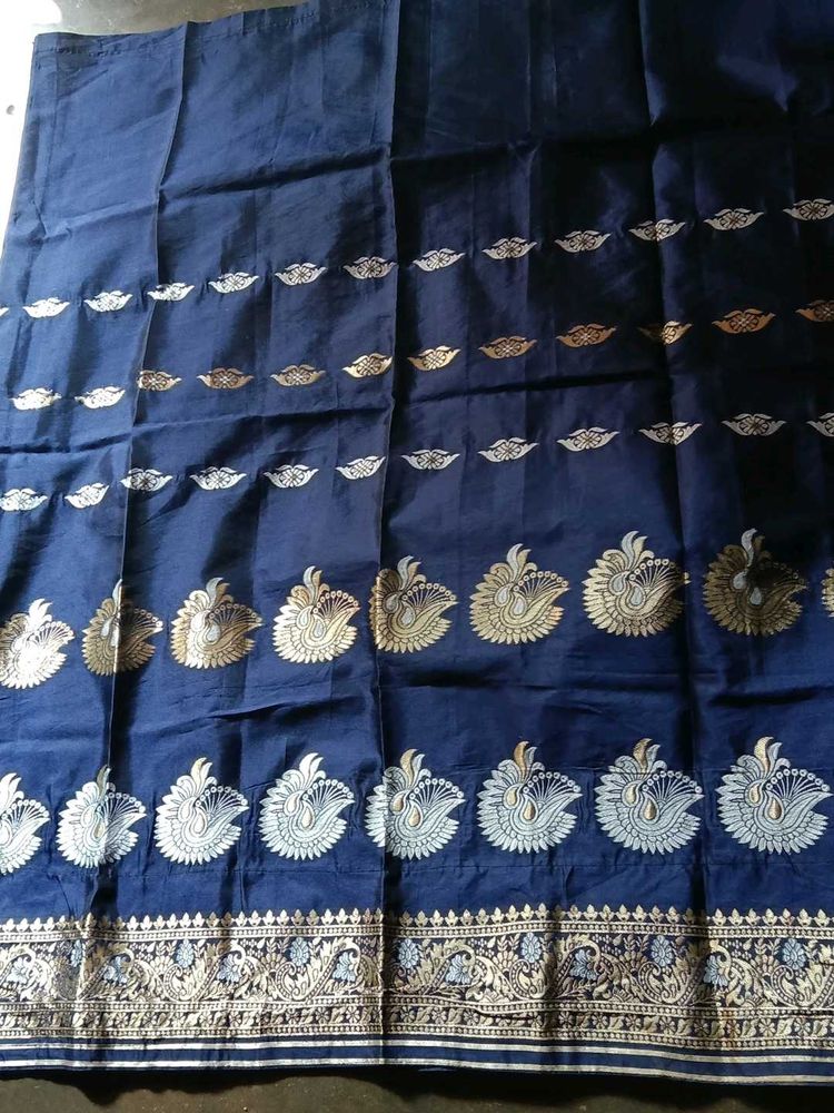 Elegant Dark Blue Saree with Gold Detailing