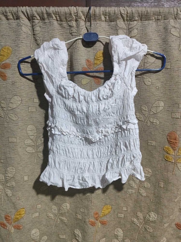 white smocked ruffle crop top